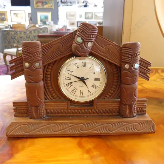VINTAGE MAORI CARVED WHARE CLOCK with quartz movement W.200mm. H.145mm 