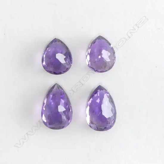 4 LOOSE AMETHYSTS