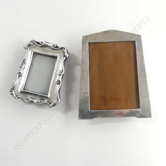 2 SILVER PHOTO FRAMES (BOTH FAULTED)