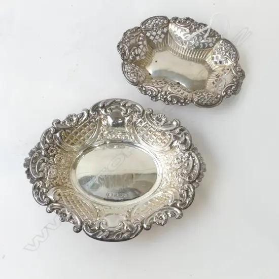 2 SILVER EMBOSSED OVAL BONBON DISHES Birmingham 1904 & London 1905. 115gms.  