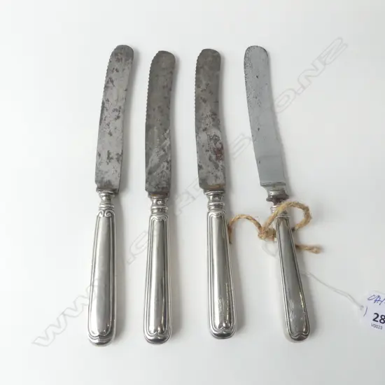 4 STEEL BLADED CONTINENTAL SILVER HANDLED KNIVES , MONOGRAMMED
