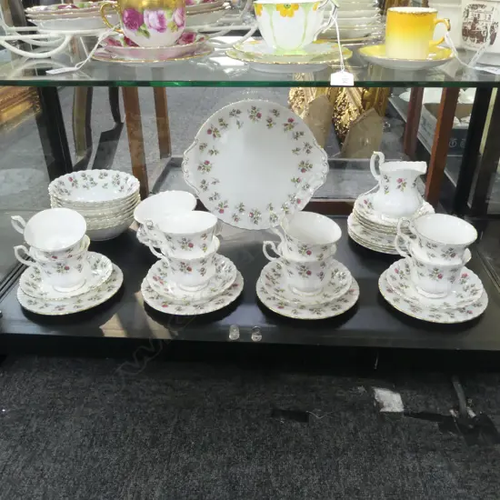 ROYAL ALBERT 'WINSOME' TEA SET; 8 TRIOS, MILK & SUGAR, CAKE PLATE, DISH & 8 CEREAL BOWLS