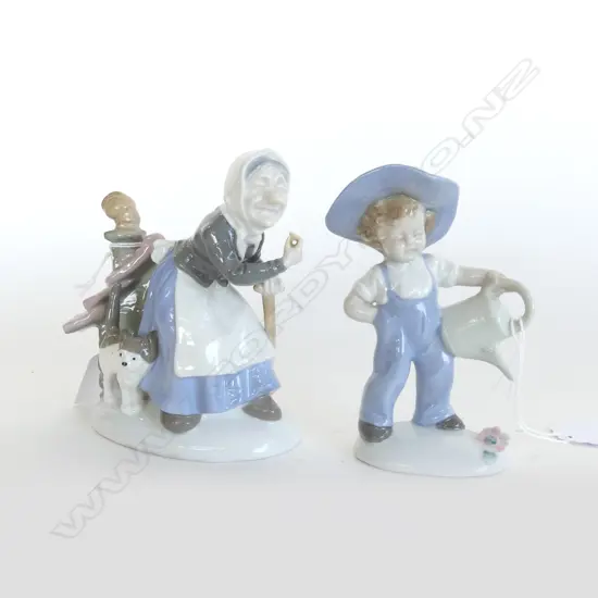 2 GERMAN PORCLAIN FIGURES LADY WITH CAT H120 & BOY WITH WATERING CAN H120