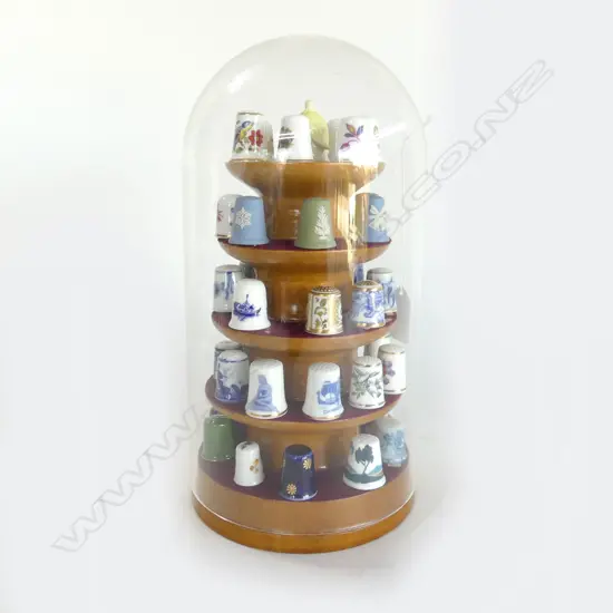 COLLECTION OF THIMBLES IN PLASTIC DOME H.265mm