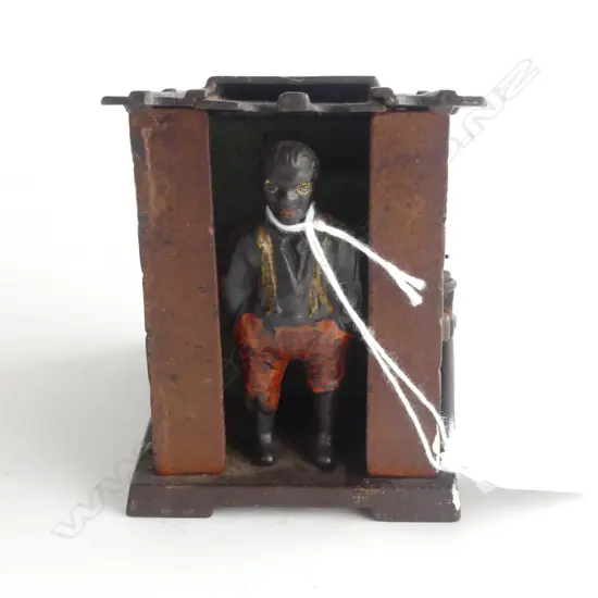 CAST IRON MONEY BANK, 1885 J E STEVENS AS A CABIN. 70X110X90mm