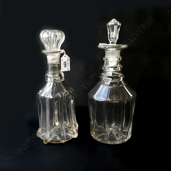 2 ANTIQUE GEORGIAN DECANTERS 1 GLASS (stopper chipped) & 1 CRYSTAL