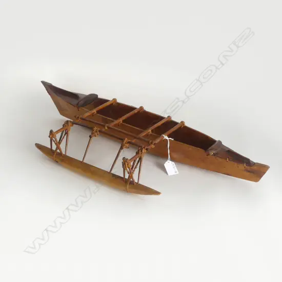 VINTAGE MELANESIAN CARVED WOOD OUTRIGGER CANOE labelled 'PITCAIRN ISLAND' L.635mm