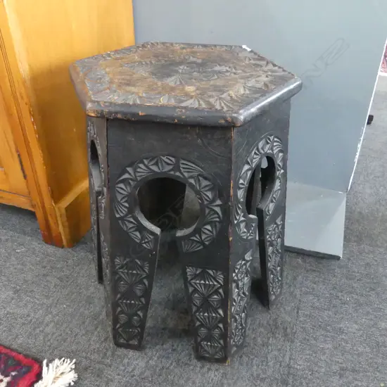 EBONISED CARVED OCTAGONAL  SIDE TABLE H.475mm 330mm dia