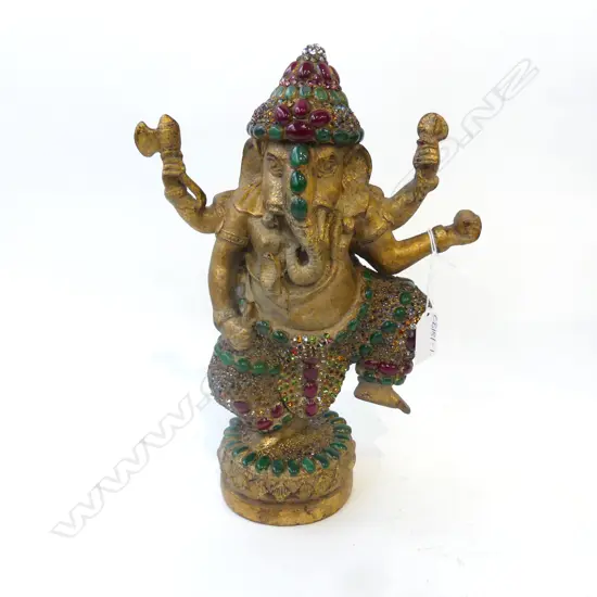 A gilded figurine of Ganesh,