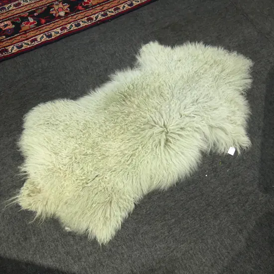 TIBETAN LAMB HIDE VERY LIGHTLY DYED labelled to the back