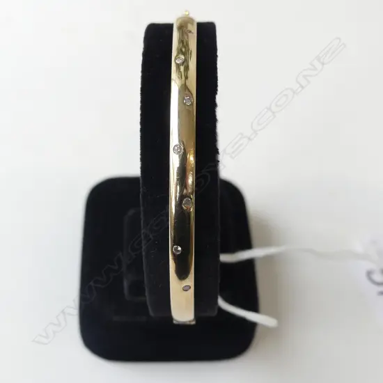 9CT YELLOW GOLD DIAMOND SET BANGLE 13gms