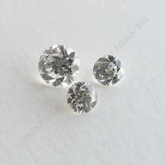 BAG OF THREE LOOSE DIAMONDS