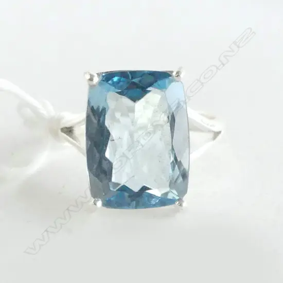 SILVER & FACET CUT BLUE TOPAZ RING