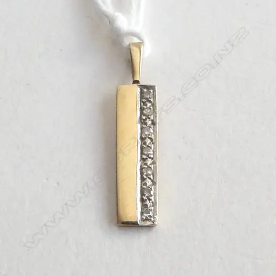 9ct GOLD & 7 DIAMOND PENDANT 0.88gms