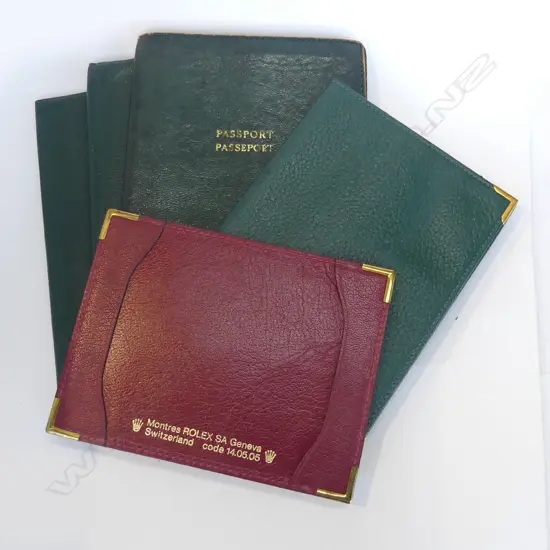 4 VINTAGE ROLEX 'PASSPORT' GREEN LEATHER FOLDERS + 1 SIMILAR RED ROLEX DOCUMENT HOLDER 