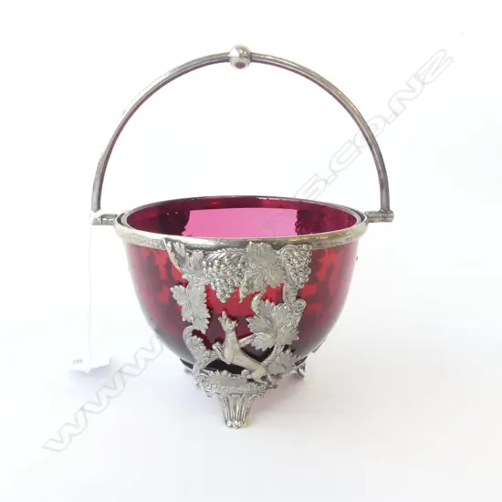 CRANBERRY BOWL IN DECORATIVE SILVER PLATE HOLDER
