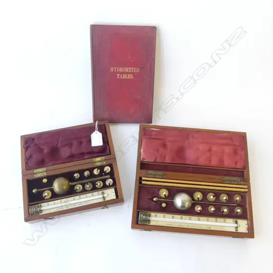 2 CASED HYDROMETERS + BOOK OF TABLES