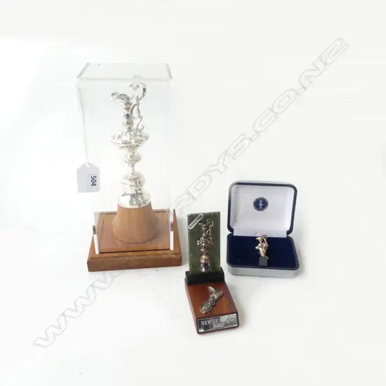 3 AMERICAS CUP SOUVENIRS INCL. STG BROOCH 10.7gms & TROPHY H.230mm, CASED