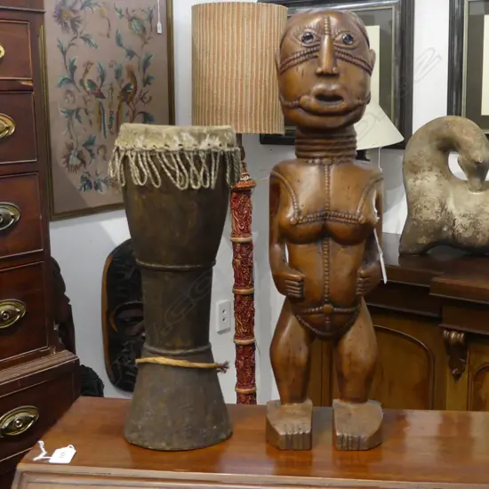 CARVED WOOD AFRICAN TRIBAL FIGURE H530MM & SKIN COVERED DRUM H390MM