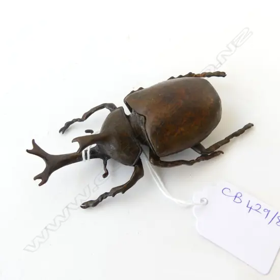 BRONZED METAL RHINOCEROS BEETLE, SIGNED TO BASE L.95mm