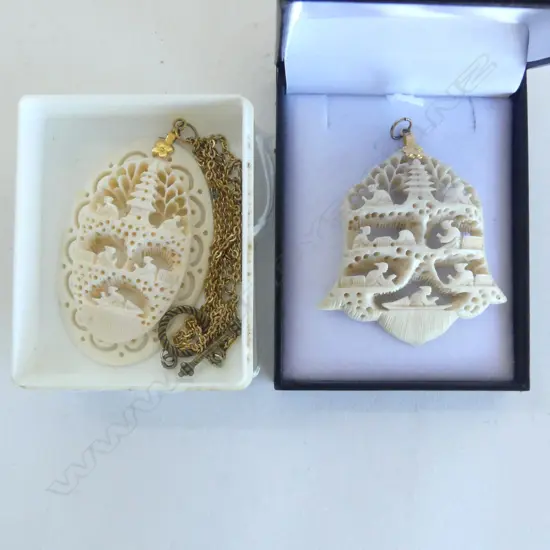 2 VINTAGE CARVED IVORY PENDANTS