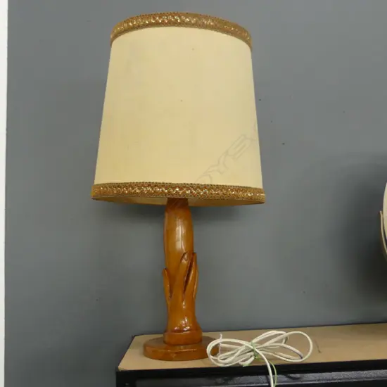 A VINTAGE PITCAIRN ISLAND CARVED HANDS LAMPBASE. H.300mm