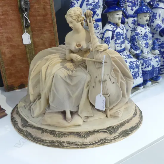 ITALIAN CERAMIC FIGURINE; CELLIST H.250mm