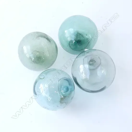 FOUR SMALL VINTAGE JAPANESE GLASS FISHING FLOATS WITH GLASS SEALS, D.80MM-90MM
