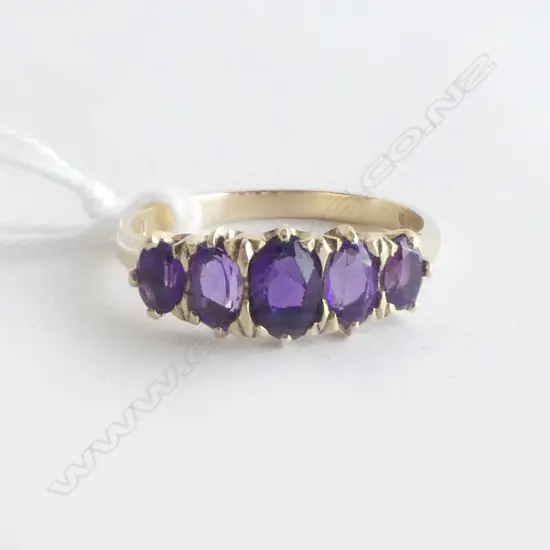 9CT YG AMETHYST 'BRIDGE' RING SIZE N  2.25gms RV $850