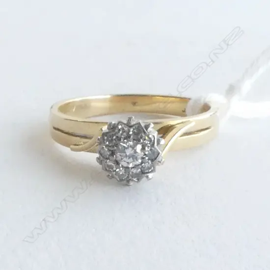 18CT YG DIAMOND 'STARBRITE' CLUSTER RING SIZE L 3.48gms RV $3000