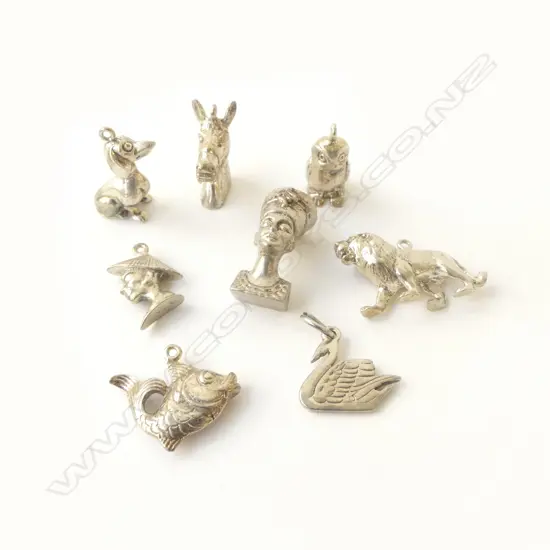 8 VINTAGE STG SILVER CHARMS