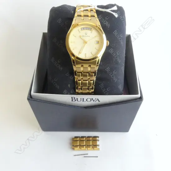 GENT'S GOLD PLATE BULOVA WRIST WATCH WITH BOX AND PAPERS (EXTRA LINK)