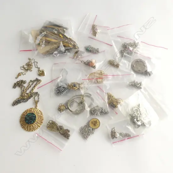 SMALL BAGS OF COSTUME JEWELLERY: NECKLACES PENDANTS CHAINS TIE PINS ETC