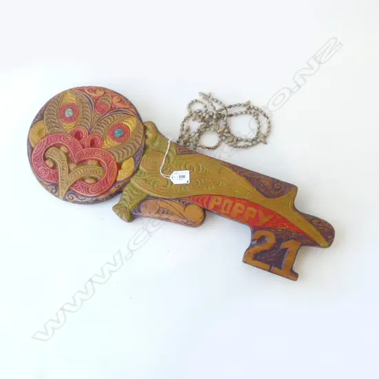 CARVED MIDCENTURY MAORI 21ST KEY  L620MM