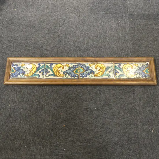 FOUR ANTIQUE SPANISH FLOOR TILES, FRAMED, 950 x 190mm