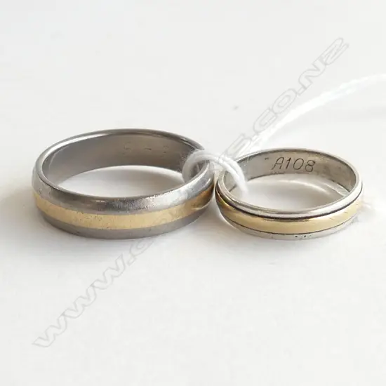 TWO 9CT 2 TONED GOLD RINGS 6.27gms SIZE Y & O