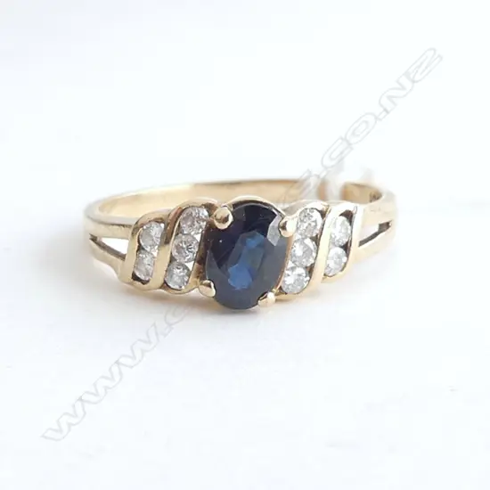 9ct SAPPHIRE & DIAMOND RING DIA=0.25ct 2.1gm SIZE N