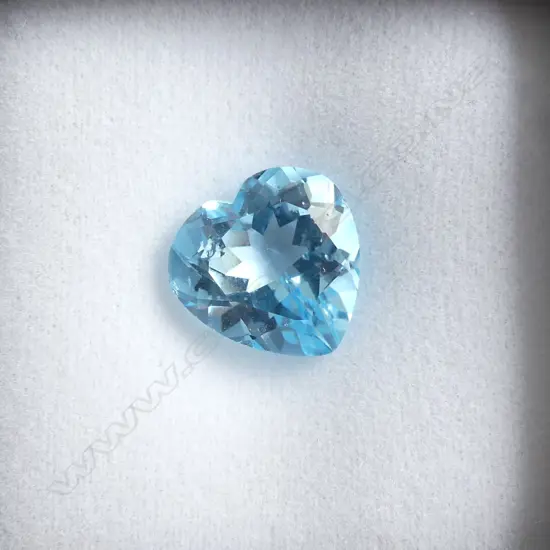 BLUE TOPAZ, HEART FACETED CUT 7.64ct AIG REPORT