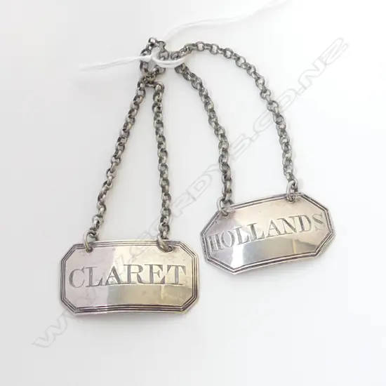 TWO SILVER WINE LABELS