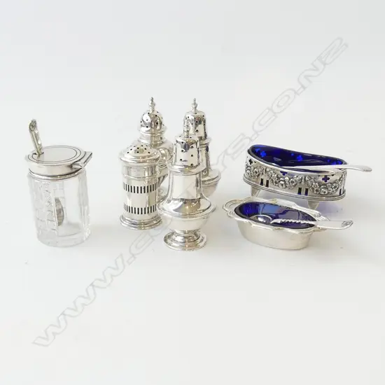 7 STG SILVER CONDIMENTS 120gms + plated spoons. Liners are blue glass