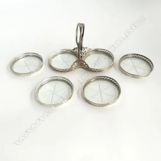 6 STG SILVER COASTERS & STAND loop handle pulled away at one fixing at the base