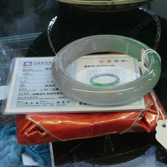 CHINESE JADE BANGLE 60mm int. dia. FAULTS