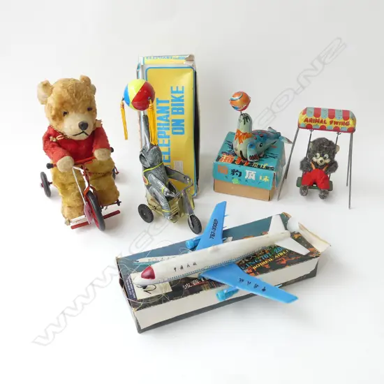 5 VINTAGE TOYS; SWING, BEAR ON BIKE, BOEING 767, ELEPHANT ON BIKE, SEAL w. BALL