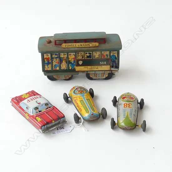 4 VINTAGE TIN TOYS; SAN FRANCISCO CABLE CAR L.150mm, FIRE CHIEF CAR, 2 RACING CARS 'LIGHTNING' & 'CHAMPION' L.100mm