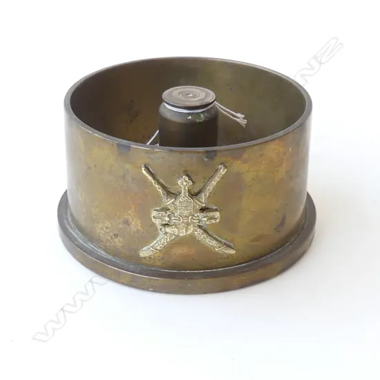 WORLD WAR TWO TRENCH ART,M SHELL BASE AS CIGAR TRAY WITH COAT OF ARMS ATTACHED MUSCAT & OMAN  ARMY. 100X50mm