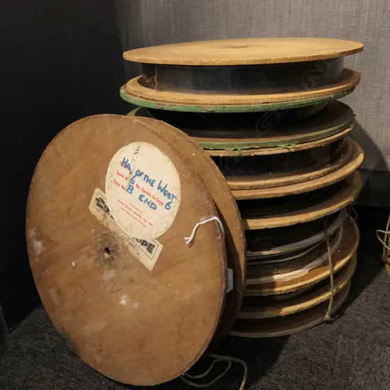 9 VINTAGE WOODEN FILM REELS 'HAN OF THE WEST'