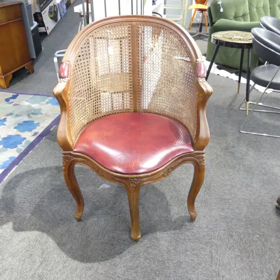 CANED BACK ARMCHAIR