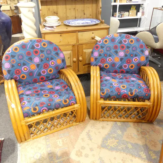 PR UPHOLSTERED CANE ARMCHAIRS