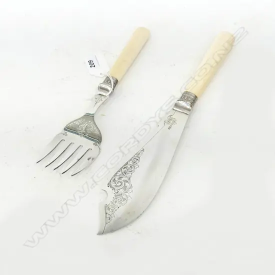 PAIR ANTIQUE IVORY & SILVER PLATE FISH SERVERS BY JAMES DIXON & SONS SHEFFIELD (NB: CRACK TO ONE HANDLE), L.315mm