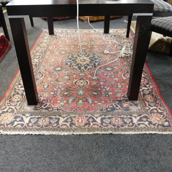 HAND KNOTTED WOOL PILE RUG